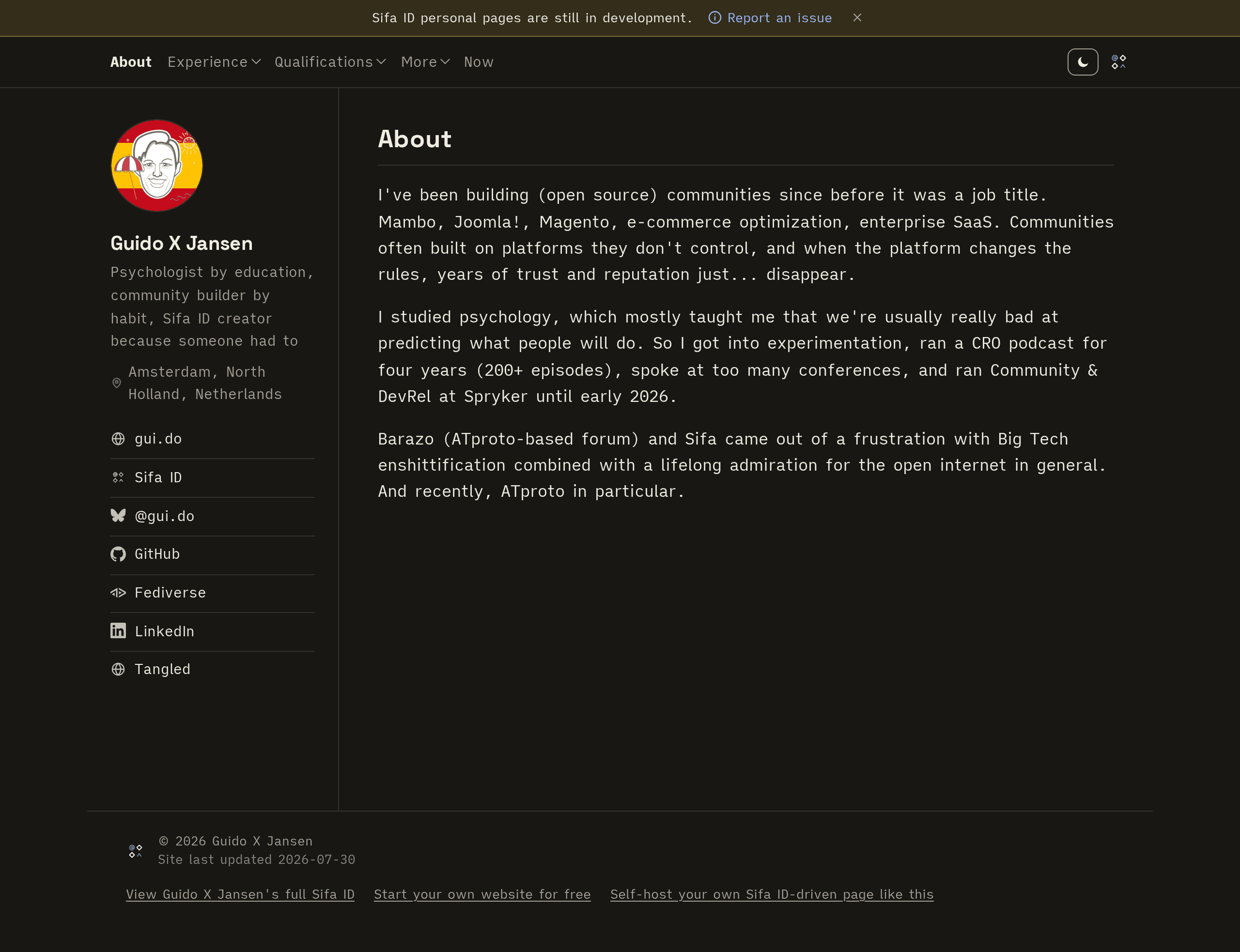 The same personal site as above, switched to dark mode using the on-page toggle.